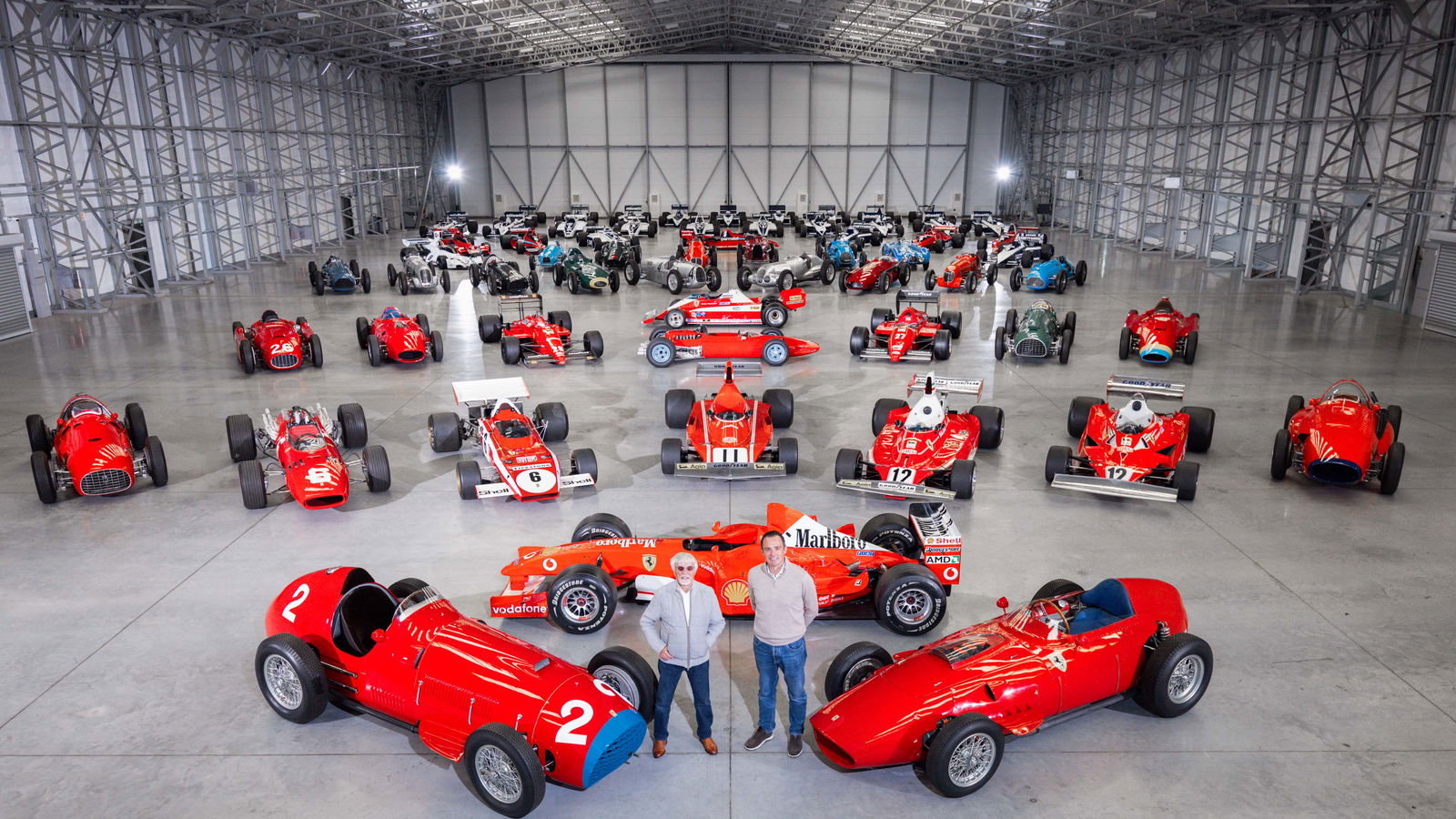 Bernie Ecclestone and Tom Hartley Jnr, along with Ecclestone's collection